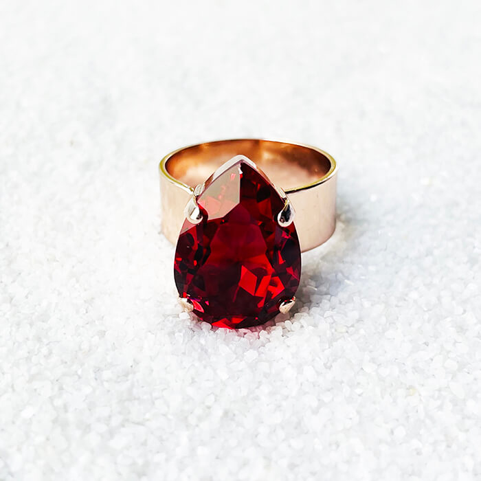 Red ring with a red pear swarovski set in rose gold