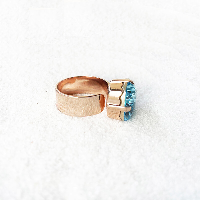 Blue Swarovski crystal ring in rose gold with adjustable band