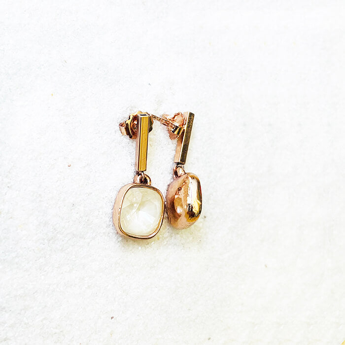 Swarovski drop earrings with rose gold finish detail