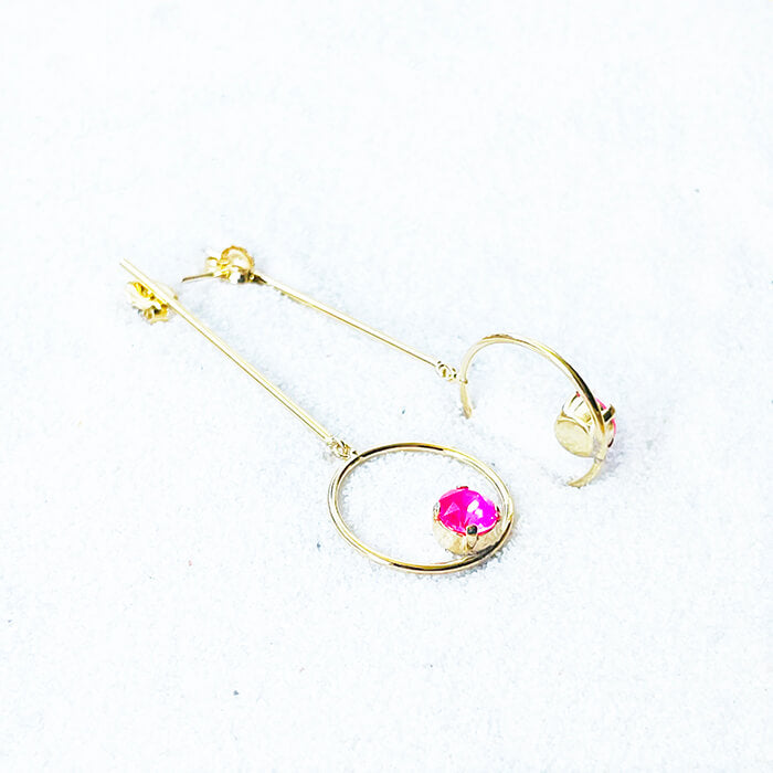 gold dangle earrings with hot pink swarovski sife angle