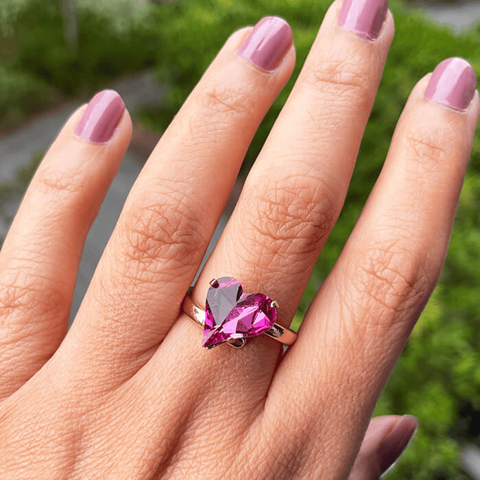 heart shaped ring with pink Swarovski - this is an adjustable ring. As worn. 