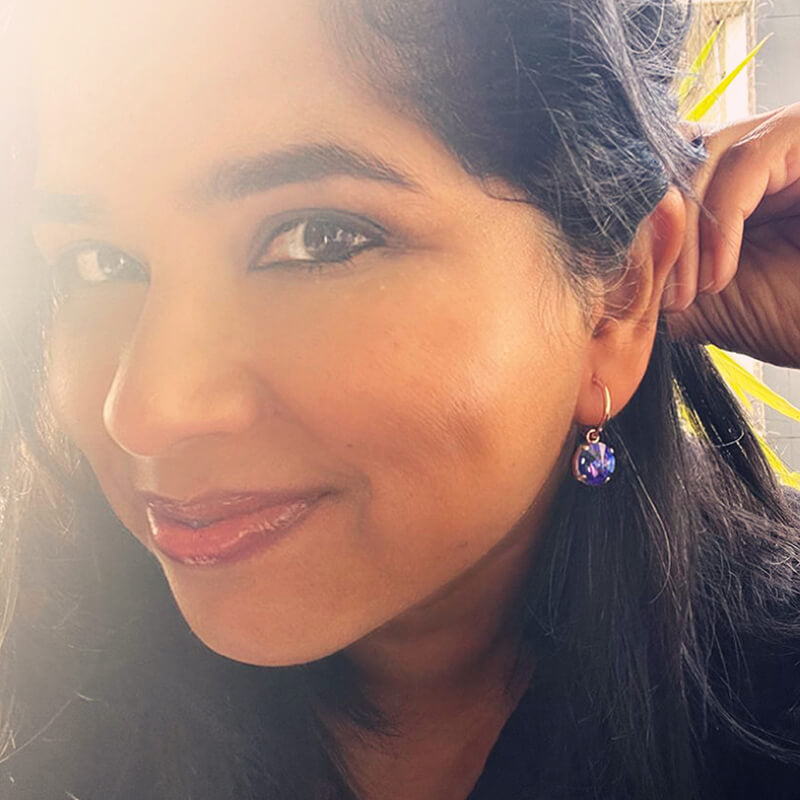 Purple Swarovski Earrings on model