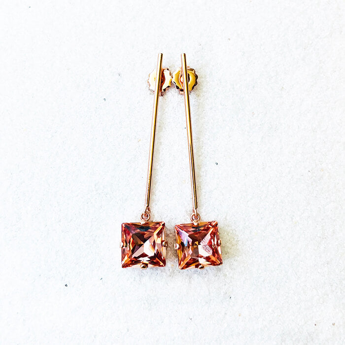rose gold dangle earrings with light rose Swarovski top view