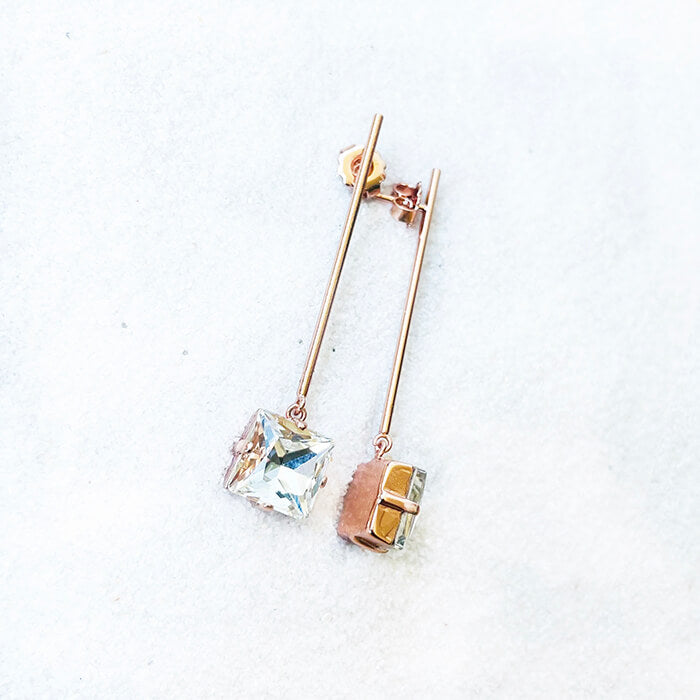 rose gold dangle earrings with clear Swarovski side view