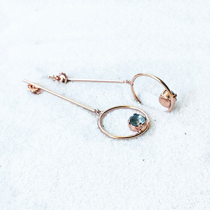 rose gold dangle earrings with grey Swarovski side view 