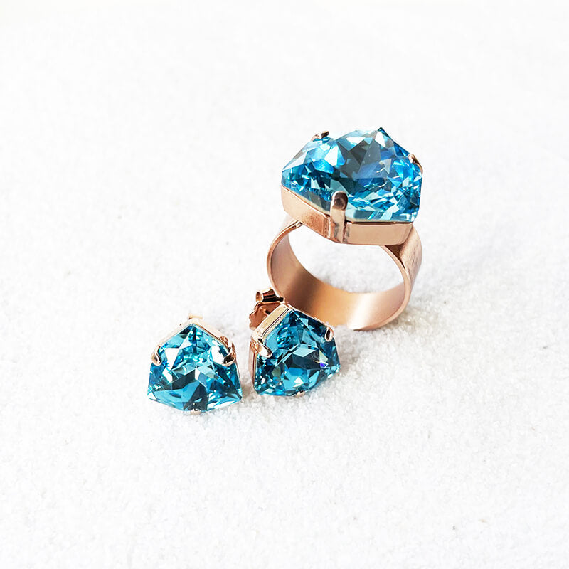 Aquamarine stud earrings with a blue Swarovski set in rose gold with adjustable blue Swarovski ring