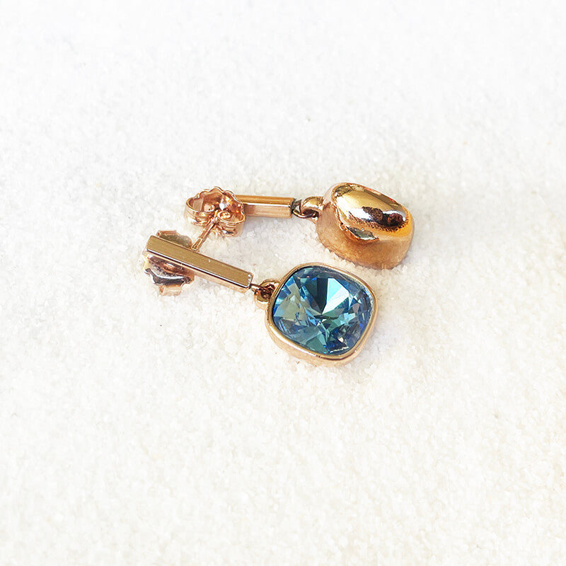 Blue Swarovski drop earrings detail