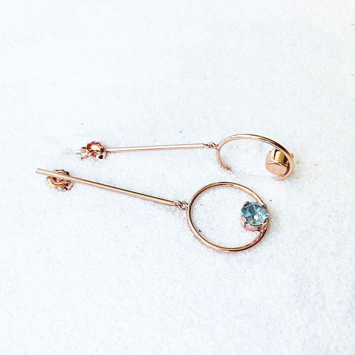 rose gold dangle earrings with grey Swarovski side view
