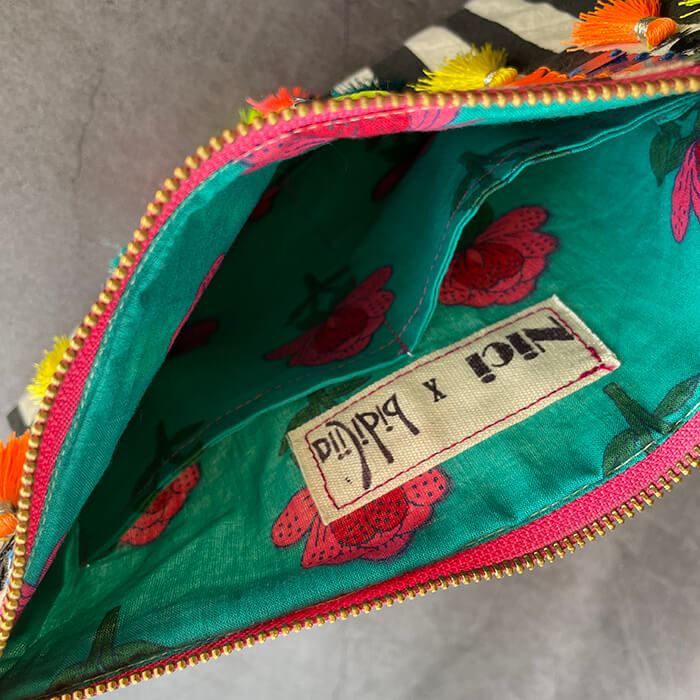 hand embroidered bag | quirky sequin designer bag printed lining