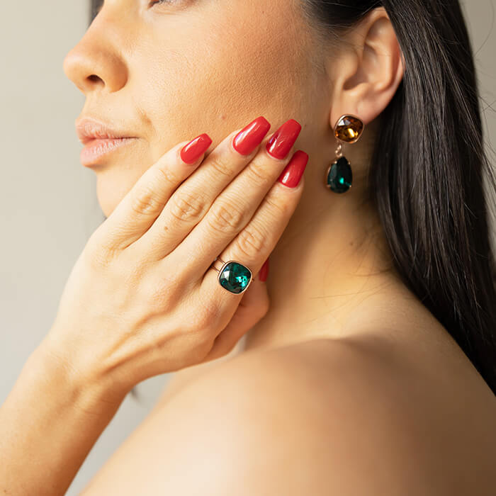 Swarovski Emerald Earrings with pear shaped emerald Swarovski and Light Amber Swarovski with emerald ring on model