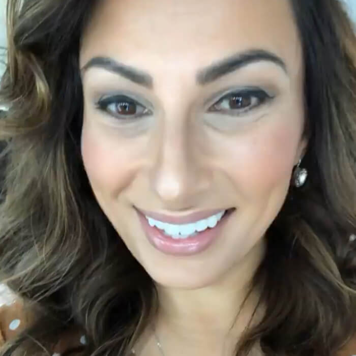 Crystal Earrings with light gold genuine Swarovski crystal set in rhodium Silver on model