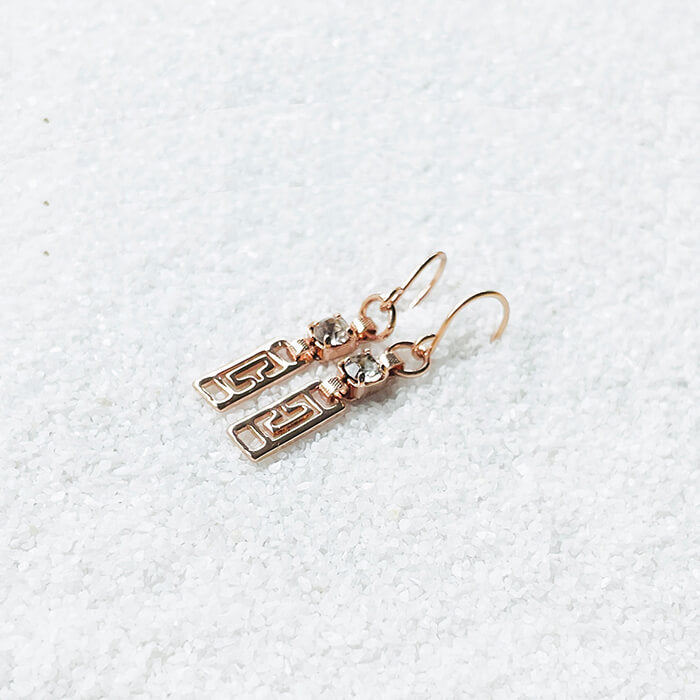 Dainty Drop Earrings with Swarovski Crystal in Rose Gold side view 