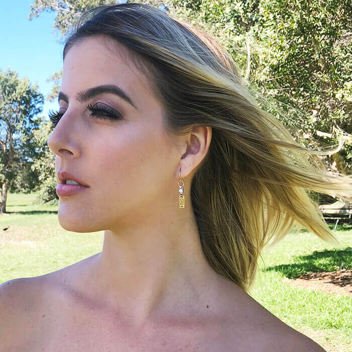 Dainty Drop Earrings with Swarovski Crystal on model