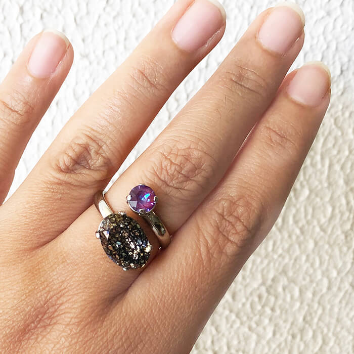 silver and burgundy purple swarovski ring on hand ethical rings