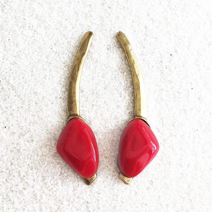 gold ethical long drop earrings with red handcast resin