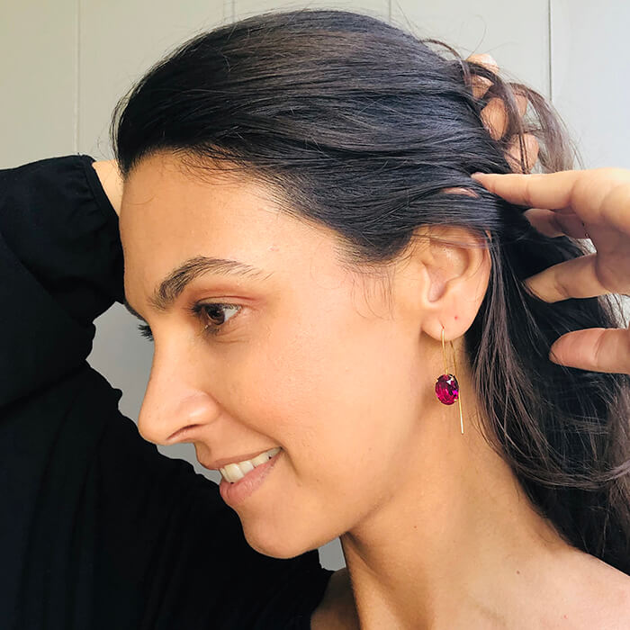 swarovski drop earrings on model 