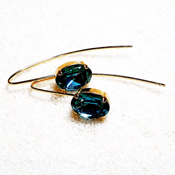 Turquoise Swarovski Crystal Earrings in gold with indicolite swarovski crystal close up shot