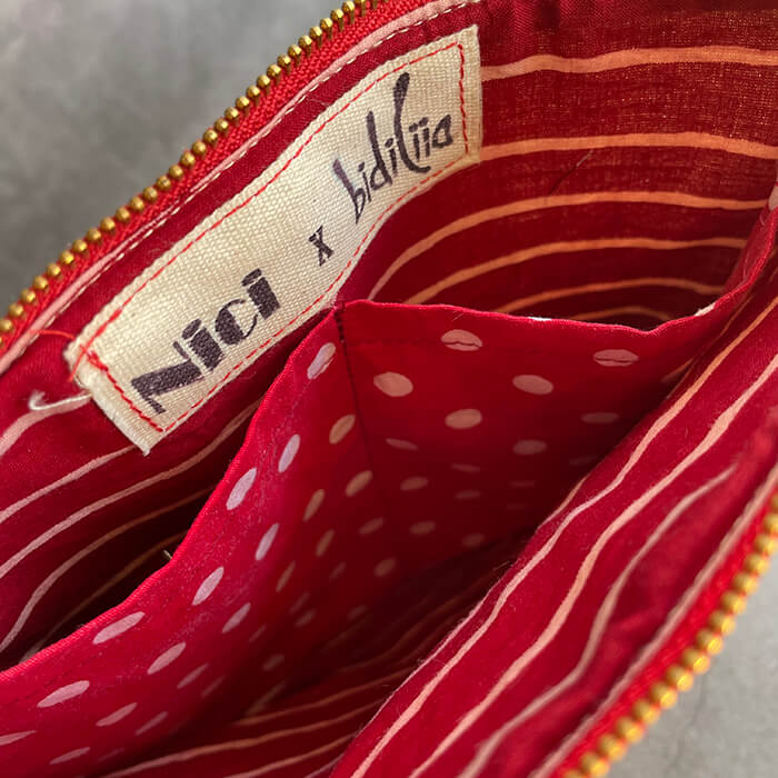 hand embroidered quirky designer bag with Frida Kahlo lining