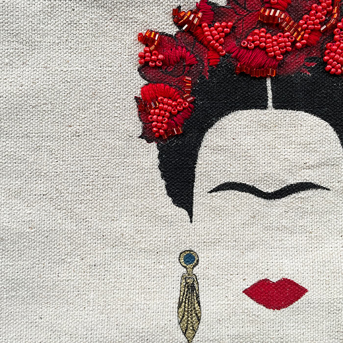hand embroidered quirky designer bag with Frida Kahlo close up 