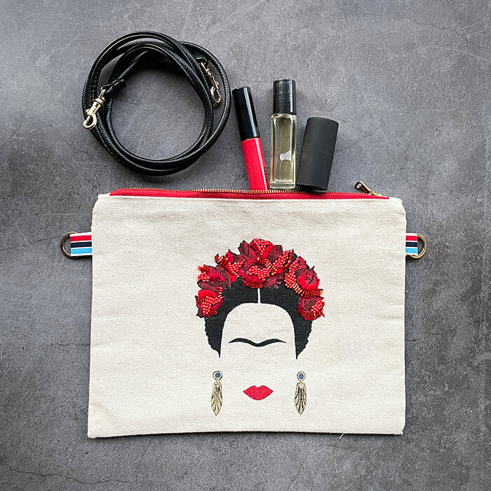 hand embroidered quirky designer bag with Frida Kahlo flat lay 