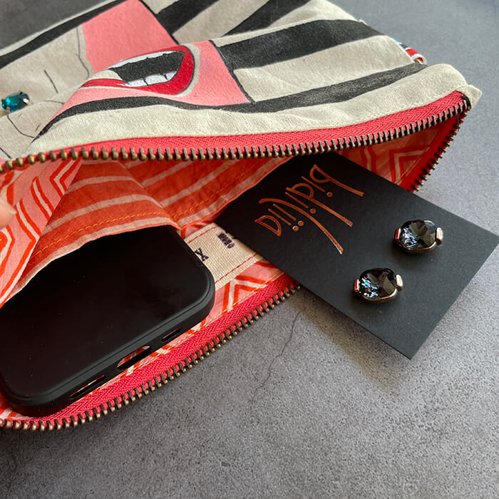 Hand painted Canvas Bag with fingers wearing a swarovski crystal biting teeth 