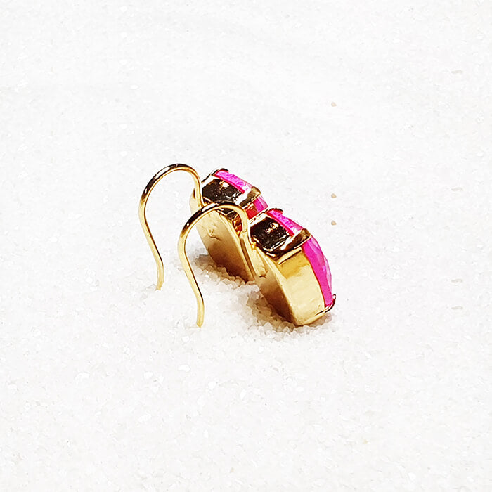 gold earrings with hot pink crystal