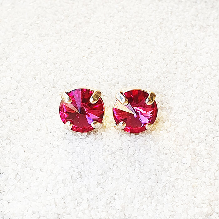 swarovksi stud earrings in silver with bright pink swarovski crystal front view