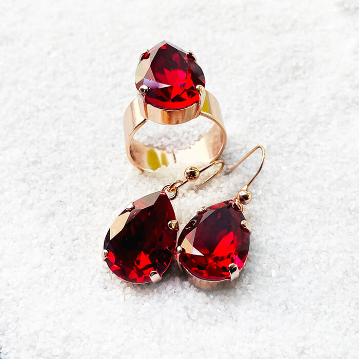 Red earrings and red ring set in rose gold 