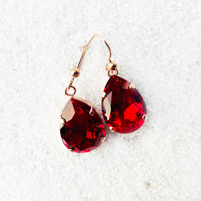 Red earrings set in rose gold australia 