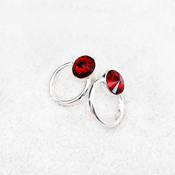Swarovski Red Earrings set in rhodium silver angular view