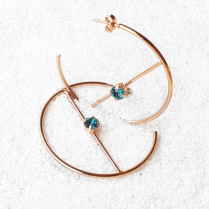 swarovski hoop earrings in rose gold with indicolite swarovski crystal