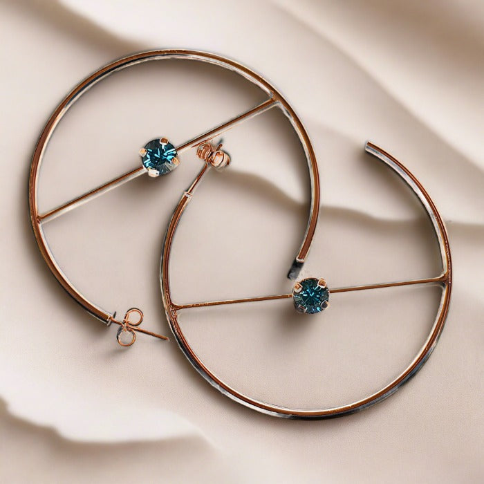 swarovski hoop earrings in rose gold with indicolite swarovski crystal unique