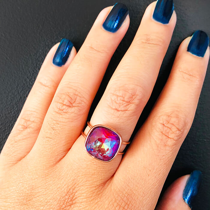 Rose Gold Ring with Pink Stone on hand