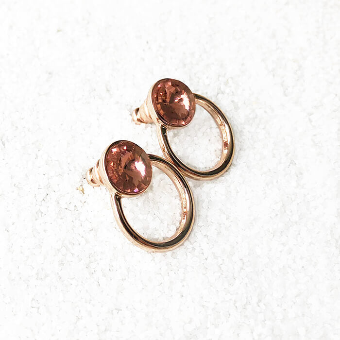 rose gold stud earrings with blush rose swarovski set in rose gold side angle