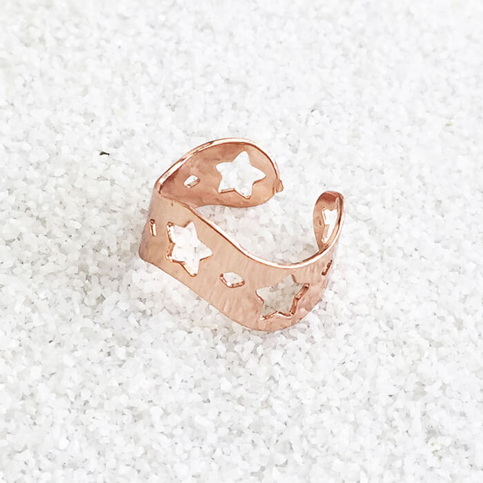 Rose gold band with star cutouts