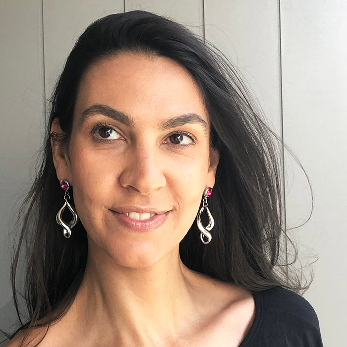 dangle earrings silver with fuschia swarovski crystal on model