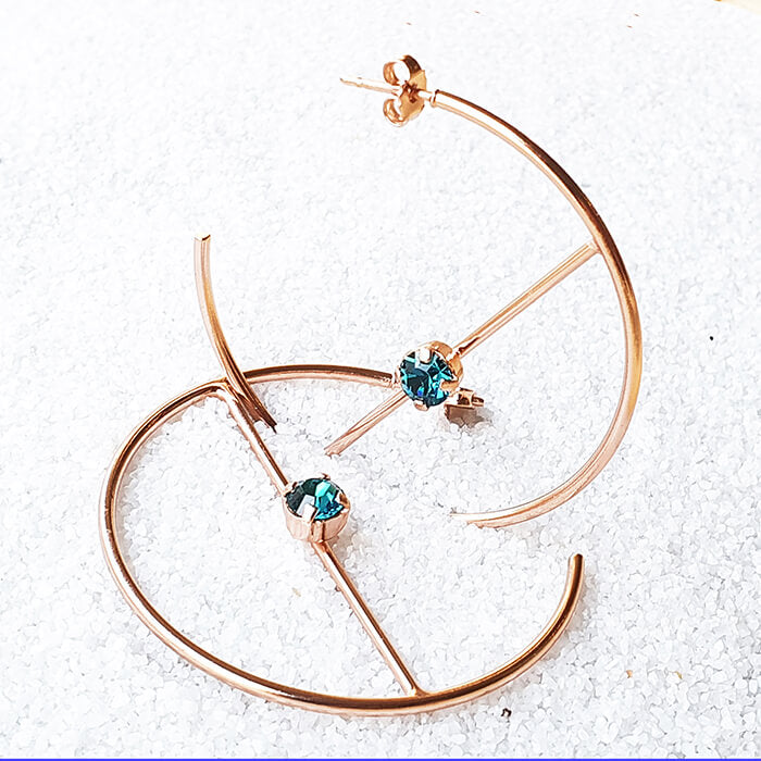 swarovski hoop earrings in rose gold with indicolite swarovski crystal beautiful