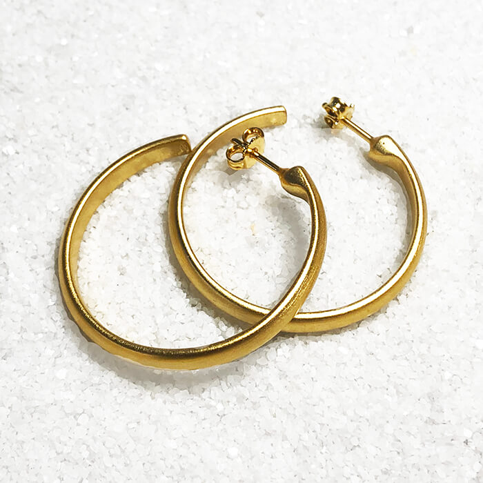 Thick Gold hoops flatlay