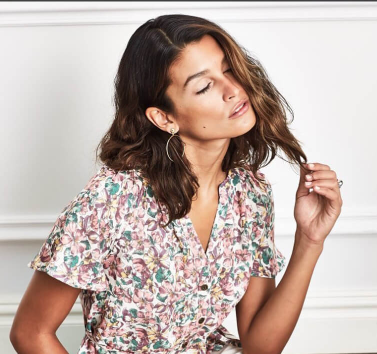 ethical drop hoop earrings on model 