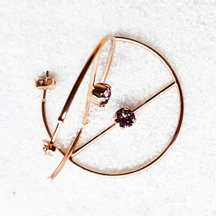 Swarovski rose gold hoop earrings aerial view