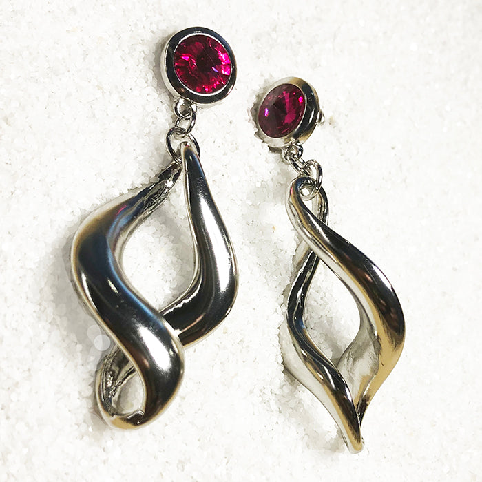 dangle earrings with fuschia swarovski crystal close up