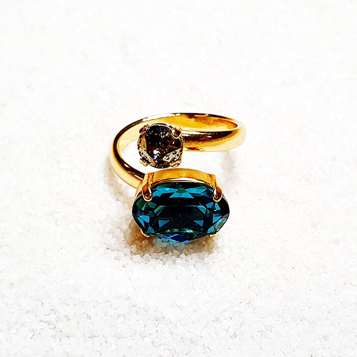 indicolite ring set in adjustable gold band close up